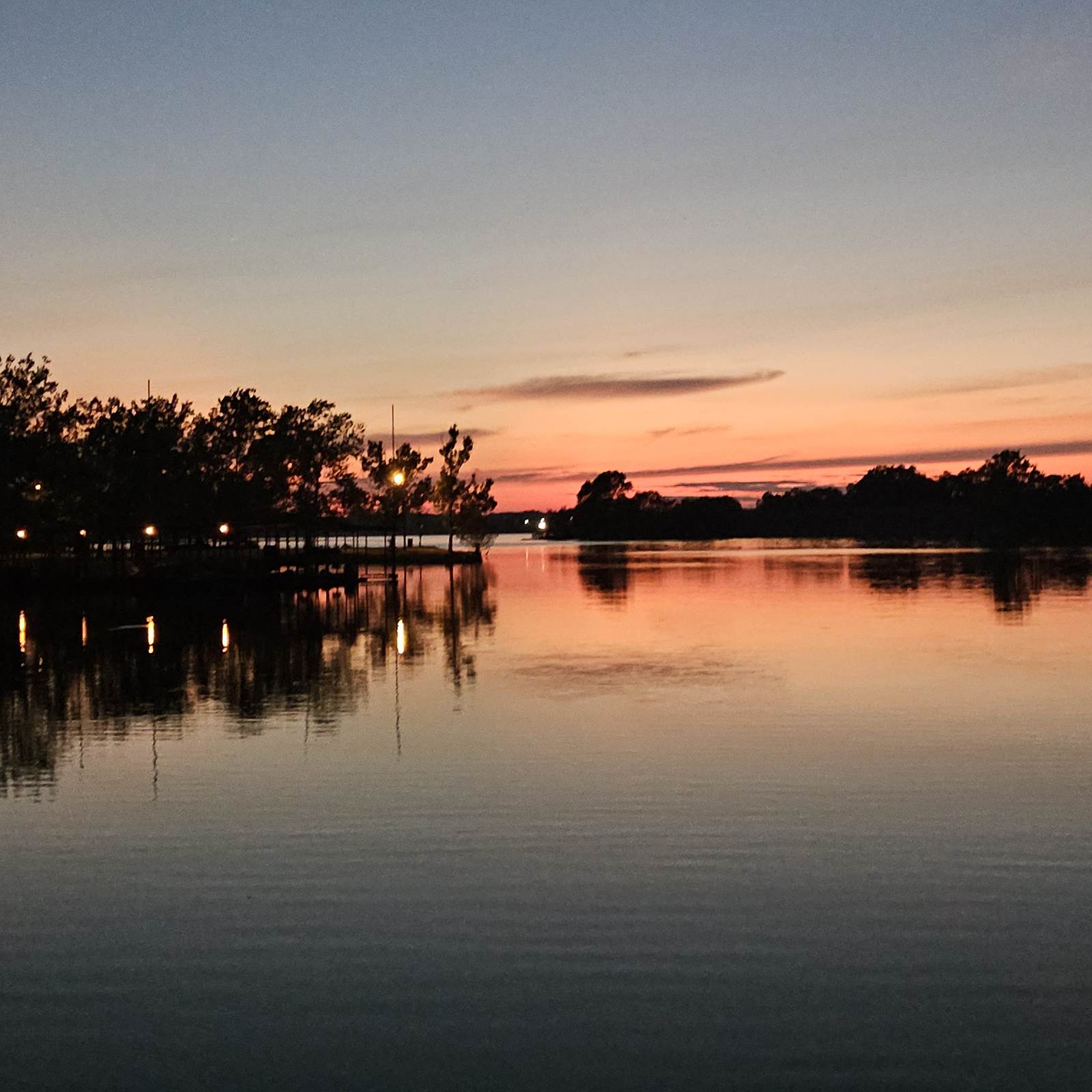 Aerial view of Spring Cove RV Park along Lake Hudson at sunrise